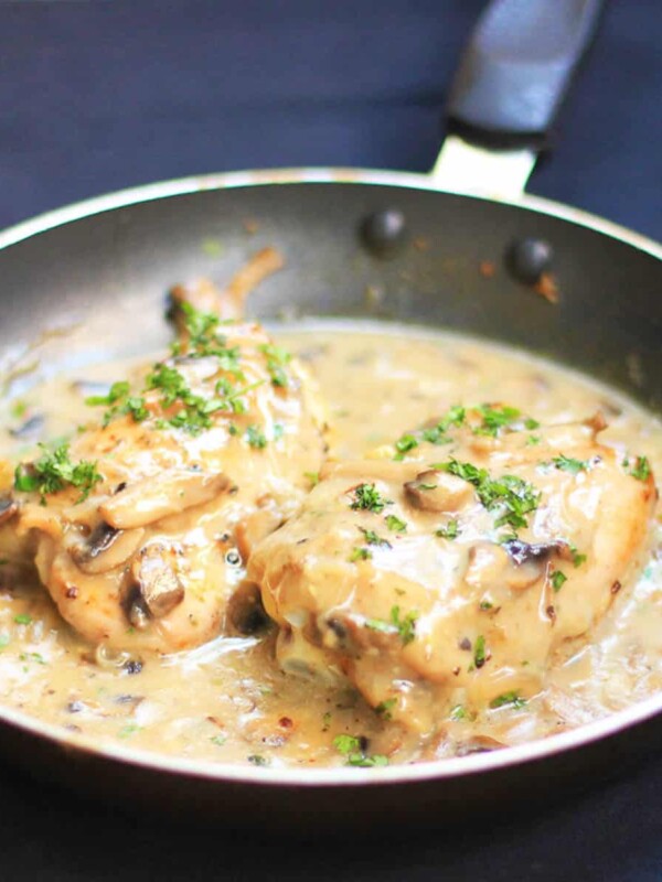 Chicken in Mushroom Sauce served in a black pan