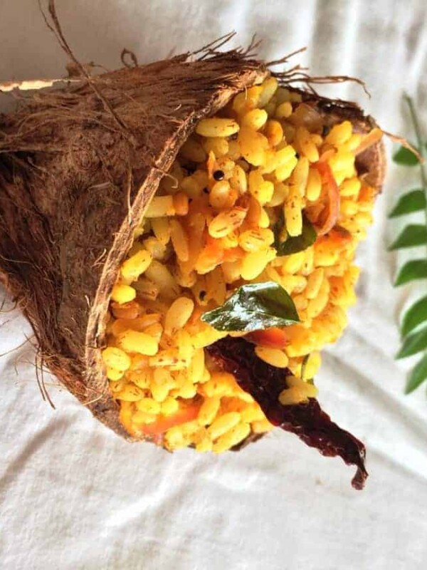 mango rice served in a coconut shell