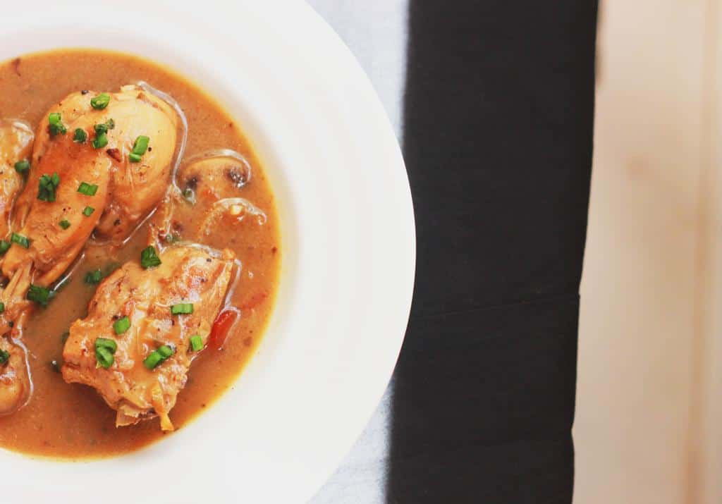 chicken stew served in a white bowl