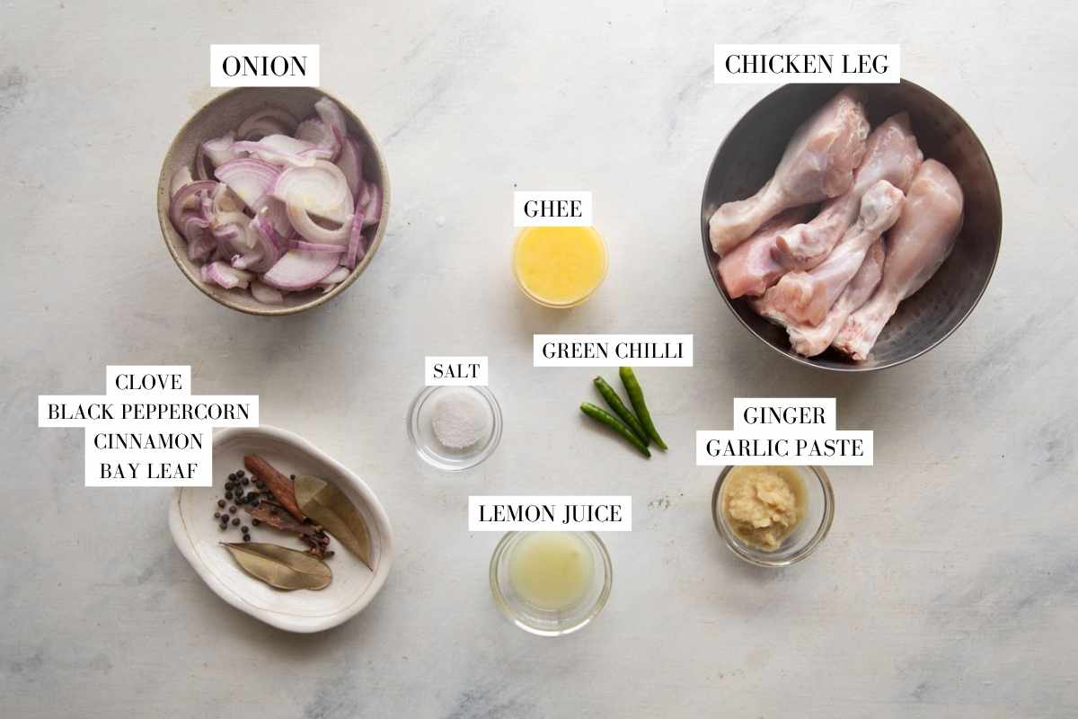 Picture of all the ingredients for Quick Onion Chicken with text to identify them
