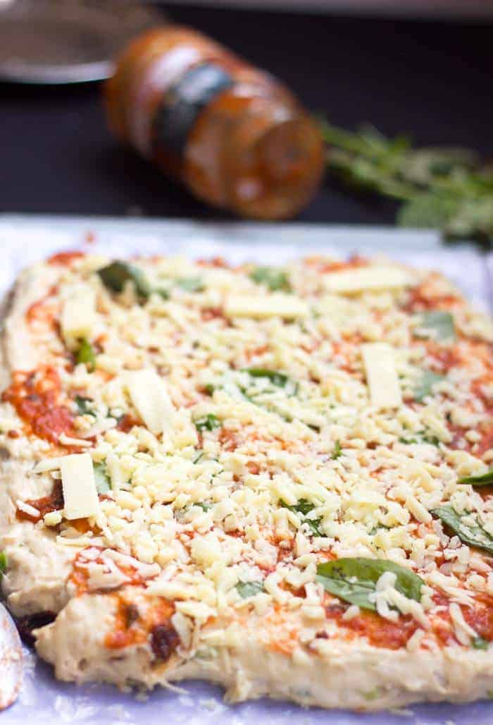 step by step image of pizza bread before it's baked