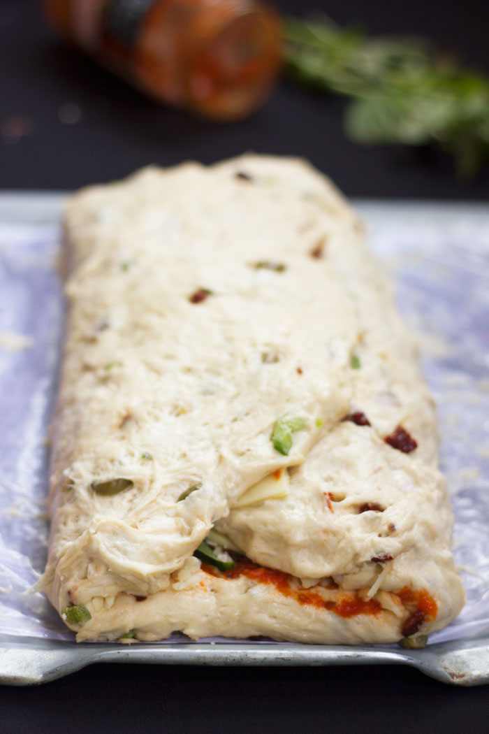 step by step image of pizza bread before it's baked