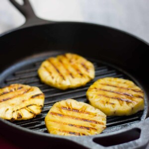 Pineapple being grilled for the Spicy Grilled Pineapple Salsa