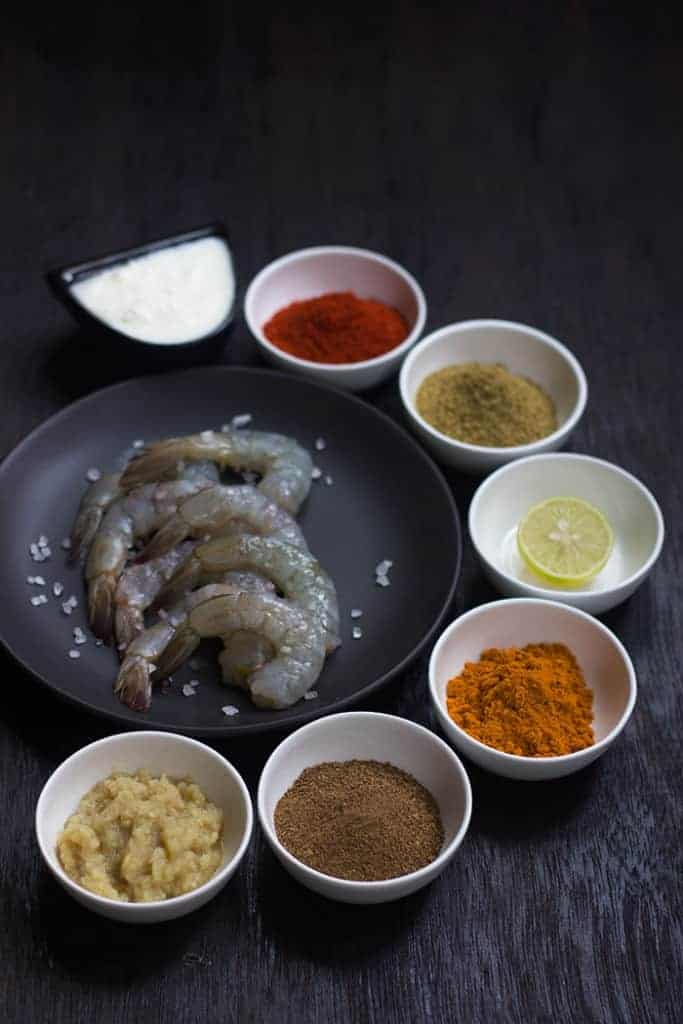 a picture of prawns with ingredients for marination