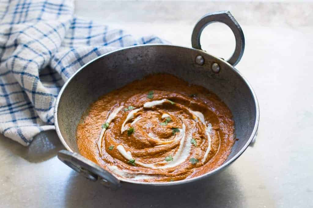 indian makhani gravy in a kahdai