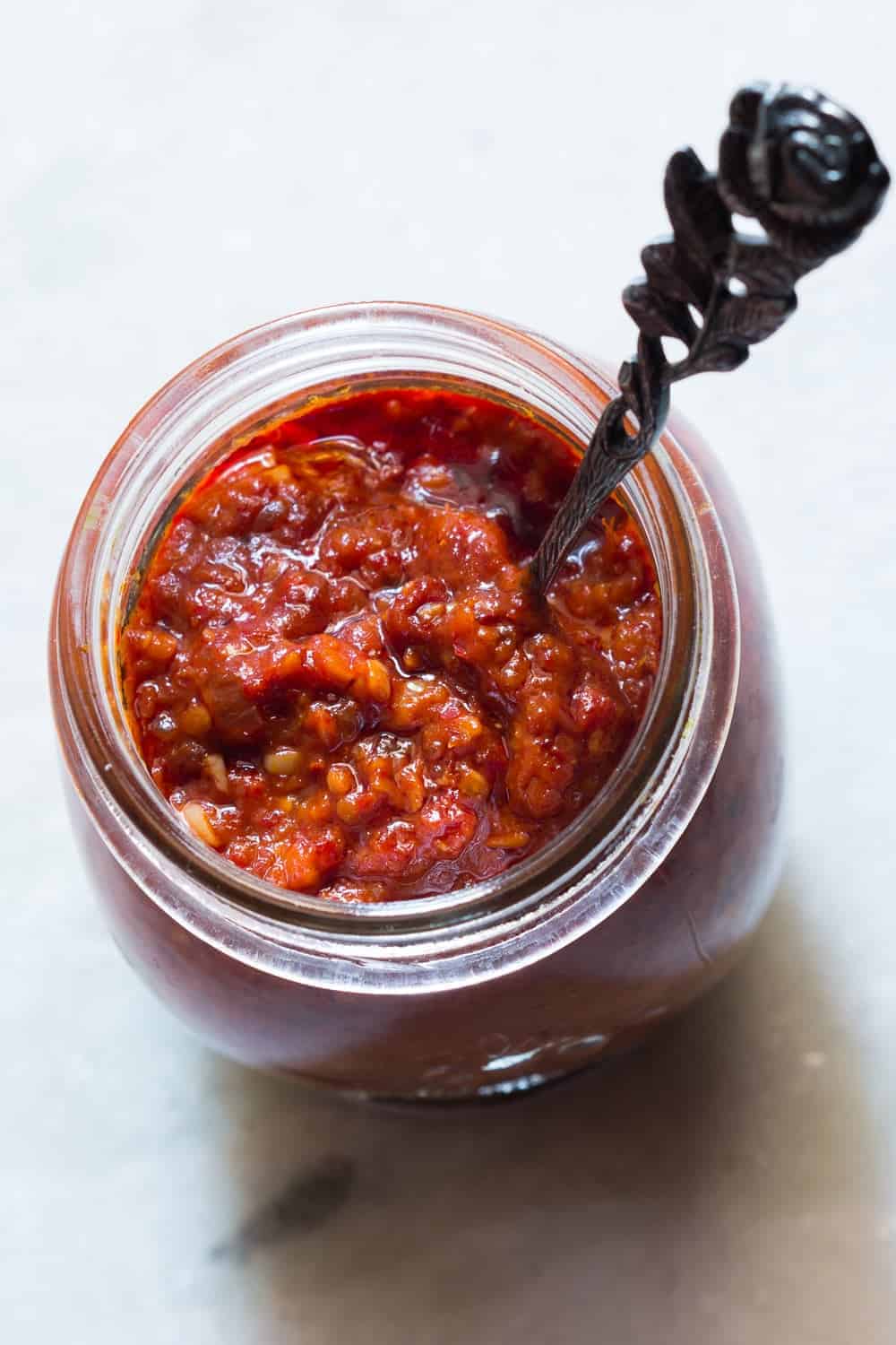 Learn how to make this simple schezwan sauce which is perfect with chicken lollipops, schezwan rice, noodles and manchurian (Step by step video recipe)