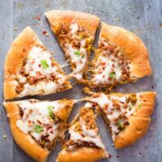 Wholewheat keema spice minced lamb pizza in a tray