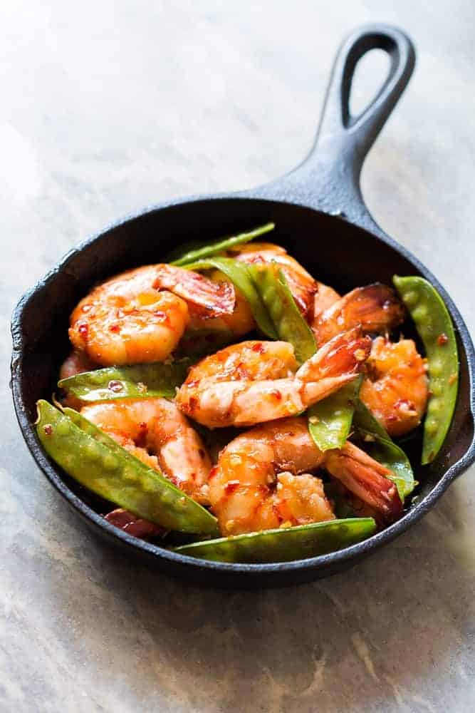 5 Ingredient Honey Chilli Garlic Tiger Prawns Looking for meals that take under 15 minutes? This is it - 5 ingredient honey garlic chilli jumbo tiger prawns! All the asian flavours you love in this one easy recipe! You can use shrimp, prawns or scampi and add whatever veggie you like - broccoli, bok choy, beans or even spinach! Soy free, gluten free, probably Whole30, Paleo and nut free!