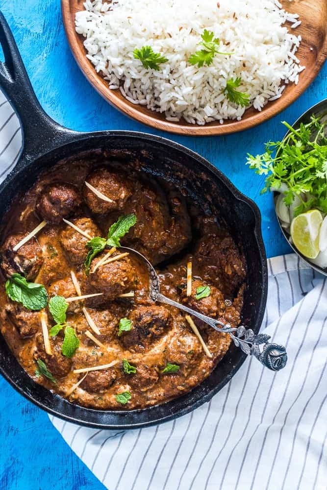 Easy One Pot Mutton (Lamb) Kofta Curry Easy One Pot Mutton (Lamb) Kofta Curry garnished with coriander and ginger and served alongside rice.