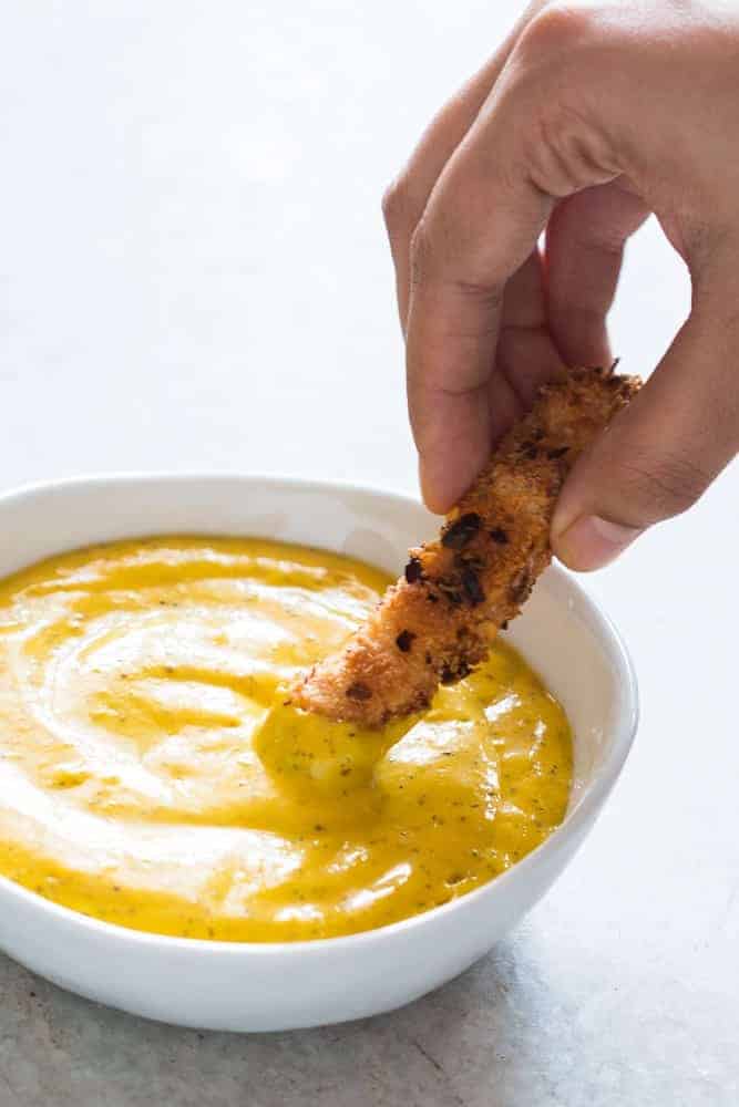 Blender Mango Mustard Dipping Sauce This easy tropical mango mustard dipping sauce is ready in 5 minutes and gets made in the blender. Goes really well with chicken tenders, wings, crackers, fries and chips!