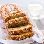 Quick Coconut Pistachio Banana Bread loaf sliced.