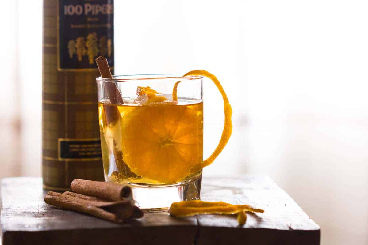 Simple tips to make orange cinnamon whiskey smash. A great fall cocktail that's perfect for the holiday table. Can be made with bourbon too.