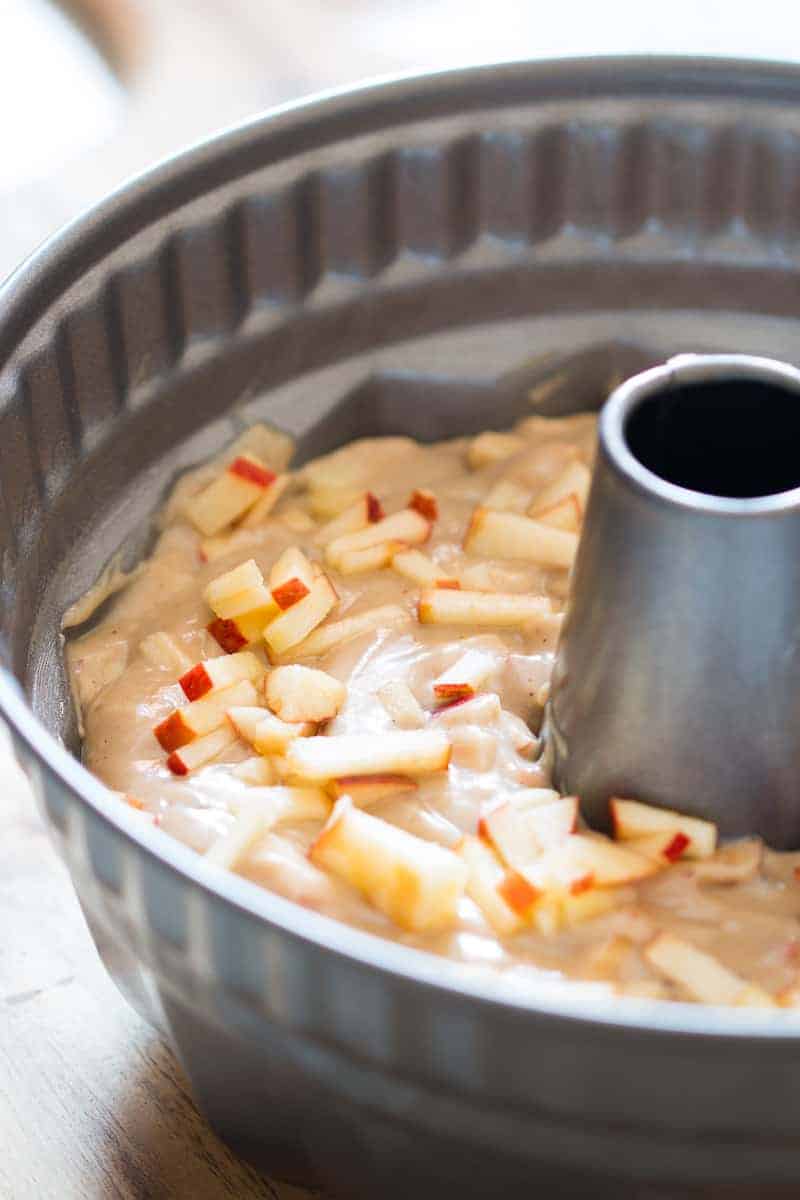 Garam Masala Eggless Apple Bundt Cake - easy, moist, spiced cake made with fresh apples and glazed with a brown butter rum sauce.