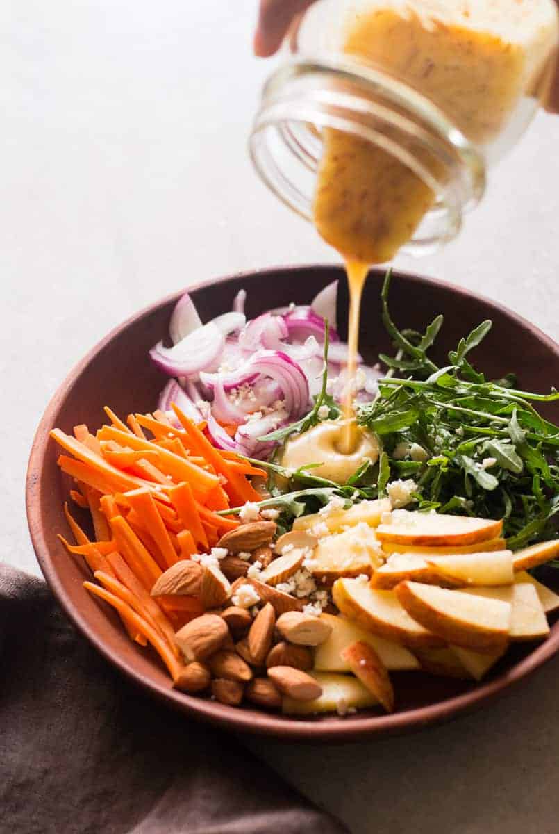 Apple Arugula Almond Salad with Orange Marmalade Dressing is a quick, easy healthy salad like waldorf but better. Add chicken, kale or cranberry to mix things up!