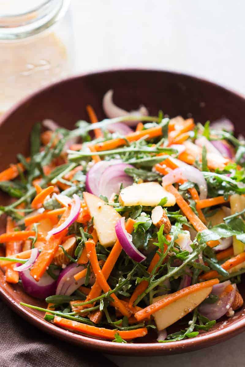 Apple Arugula Almond Salad with Orange Marmalade Dressing is a quick, easy healthy salad like waldorf but better. Vegan, Gluten Free and the perfect side dish to your dinner!