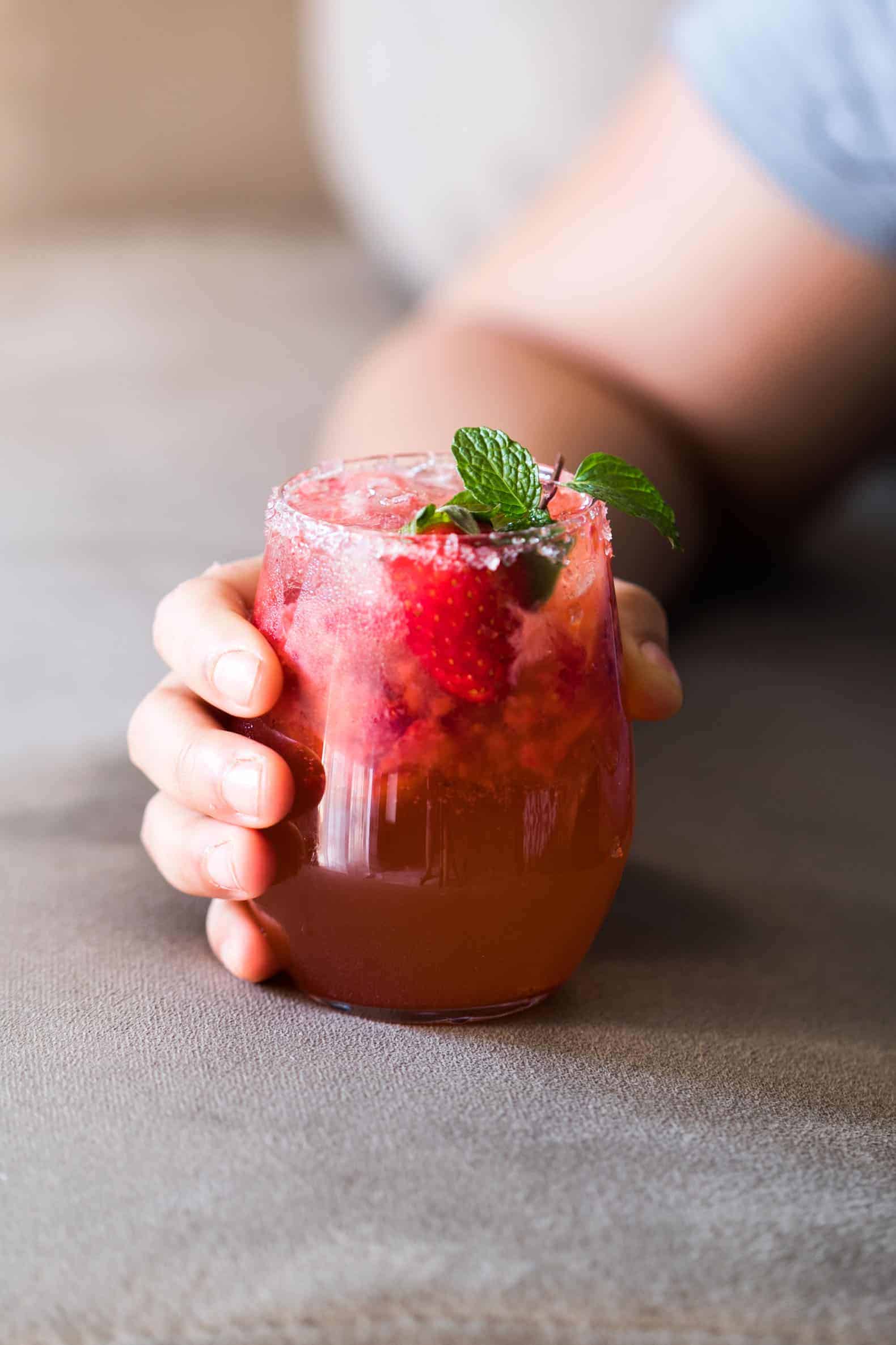 Mint Strawberry Moscow Mule is the perfect summer cocktail. Made with vodka and ginger beer it's super easy and our go to drink these days!