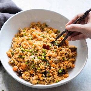 Schezwan Fried Rice from leftover rice served in a white bowl.