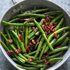 Sauteed Brown Sugar Bacon Garlic Green Beans in a pan.