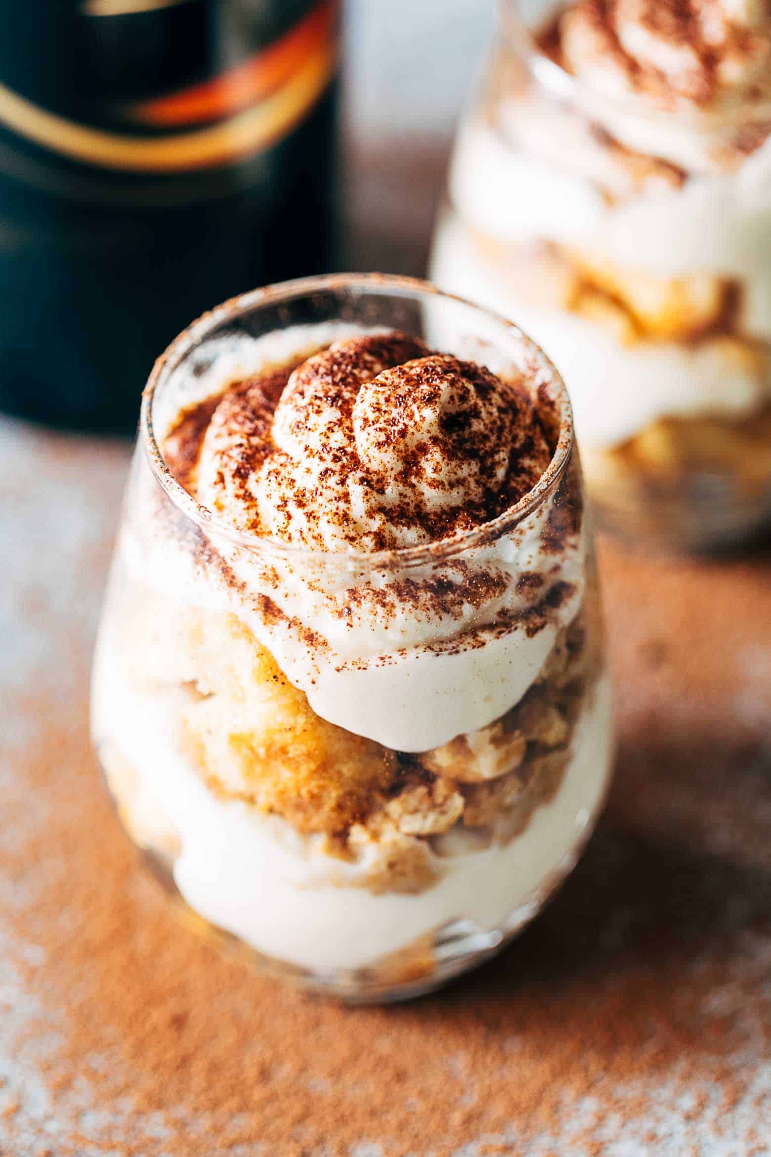 Easy Baileys Tiramisu Trifle Cups are a fun take on the classic Italian Tiramisu recipe. Made eggless, this make-ahead eight ingredient dessert is the perfect summer recipe.