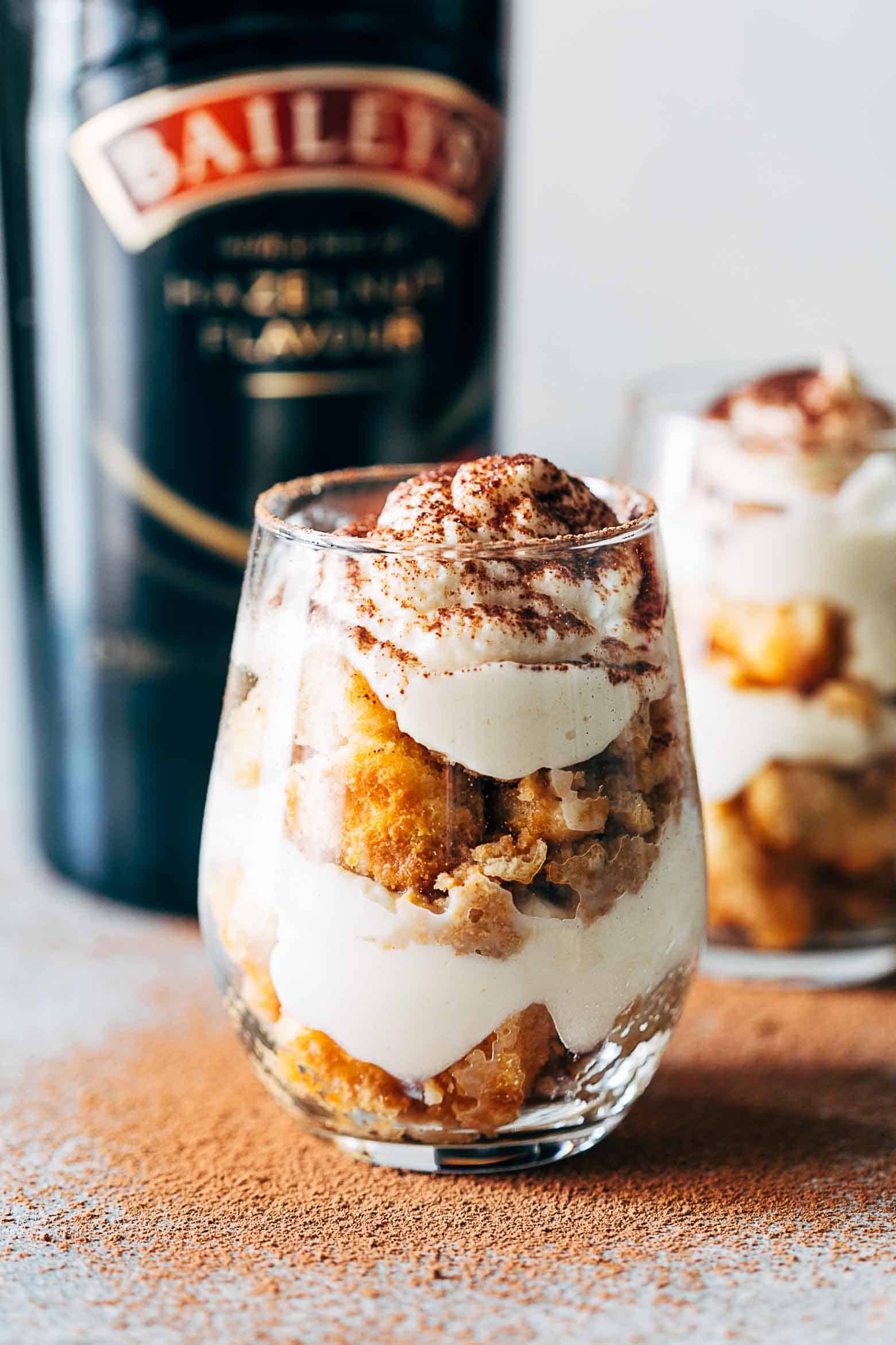 Easy Baileys Tiramisu Trifle Cups are a fun take on the classic Italian Tiramisu recipe. Made eggless, this make-ahead eight ingredient dessert is the perfect summer recipe.