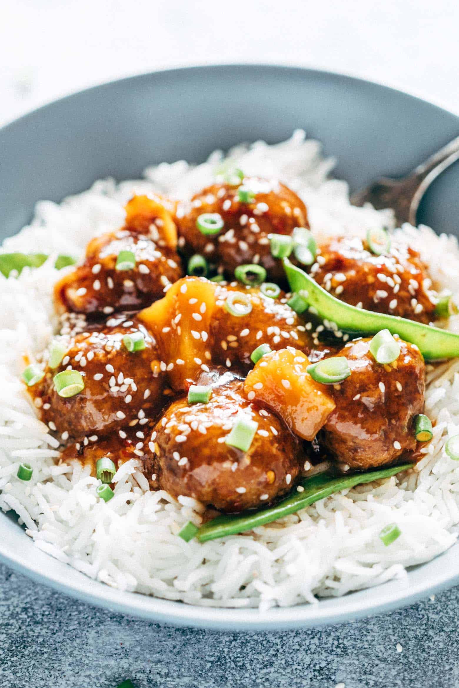 Asian inspired slow cooker teriyaki meatballs with pineapple are super easy, low carb and can be made in your crockpot. Juicy, succulent, these teriyaki pineapple meatballs can also be baked in the oven.