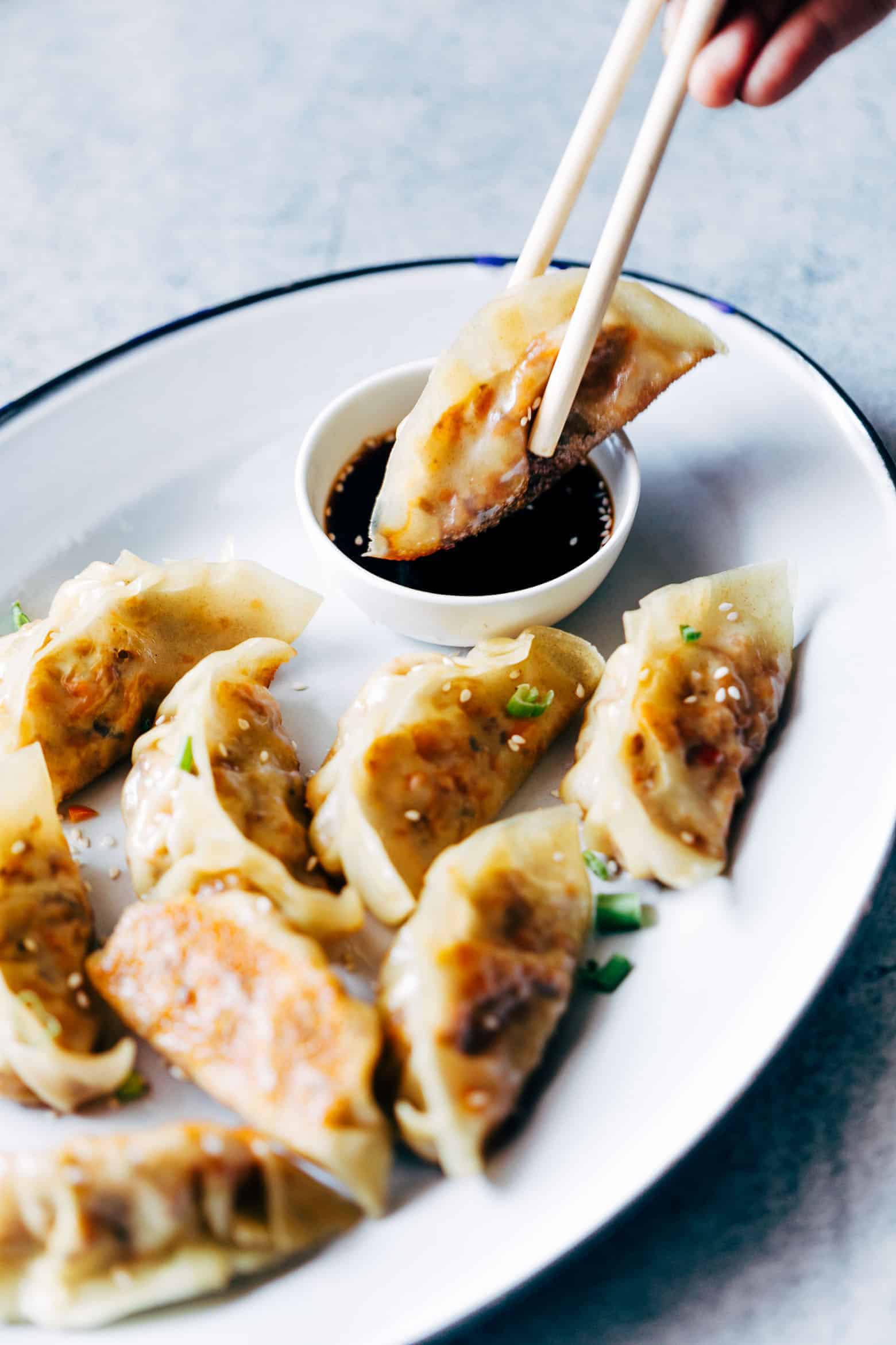 These vegetarian gyoza potstickers are stuffed with a delicious mixture of carrot, shiitake mushrooms and paneer and are insanely ease to make! Don't be intimidated because I have step by step instructions for you to make them at home.