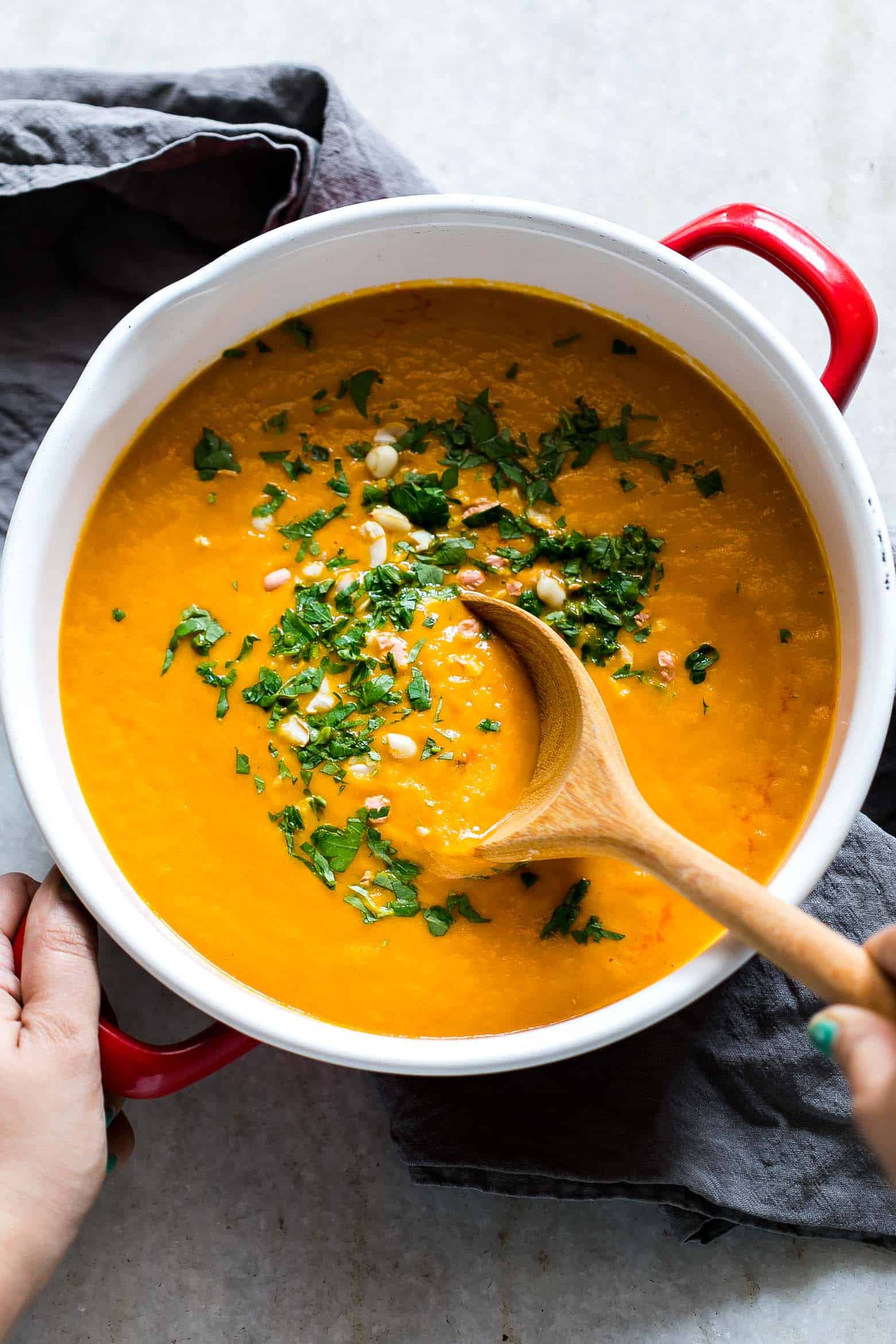 Thai Ginger Carrot Soup garnished with cilantro.