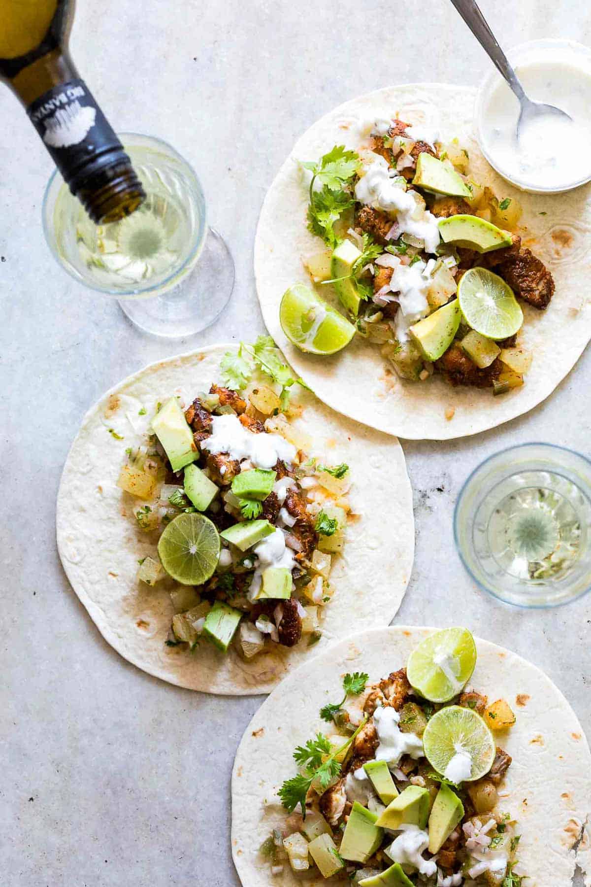 Tilapia Fish Tacos with Pineapple Salsa served with a side of Big Banyan's sauvignon blanc.