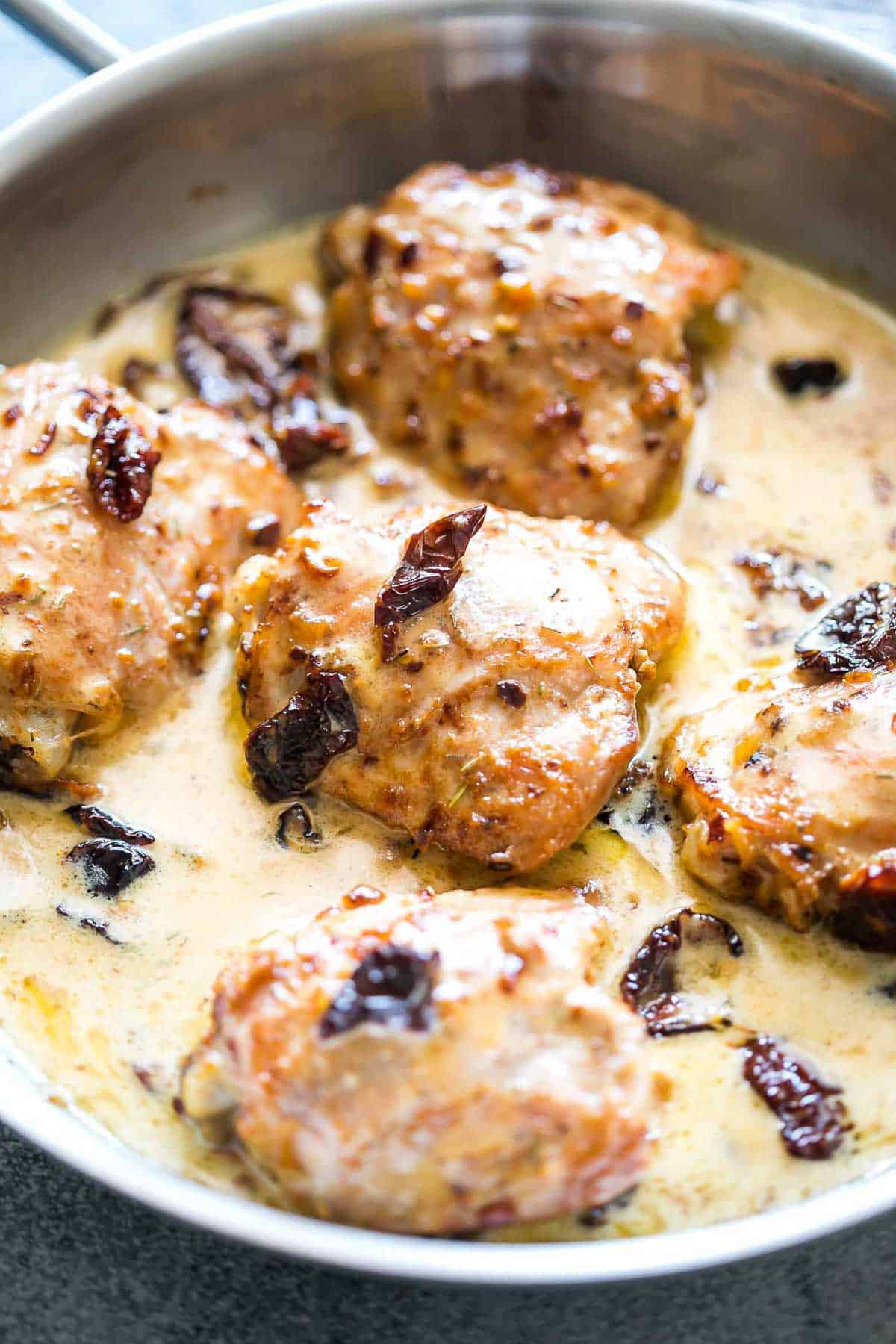Creamy Sun-dried Tomato Chicken in a pan.