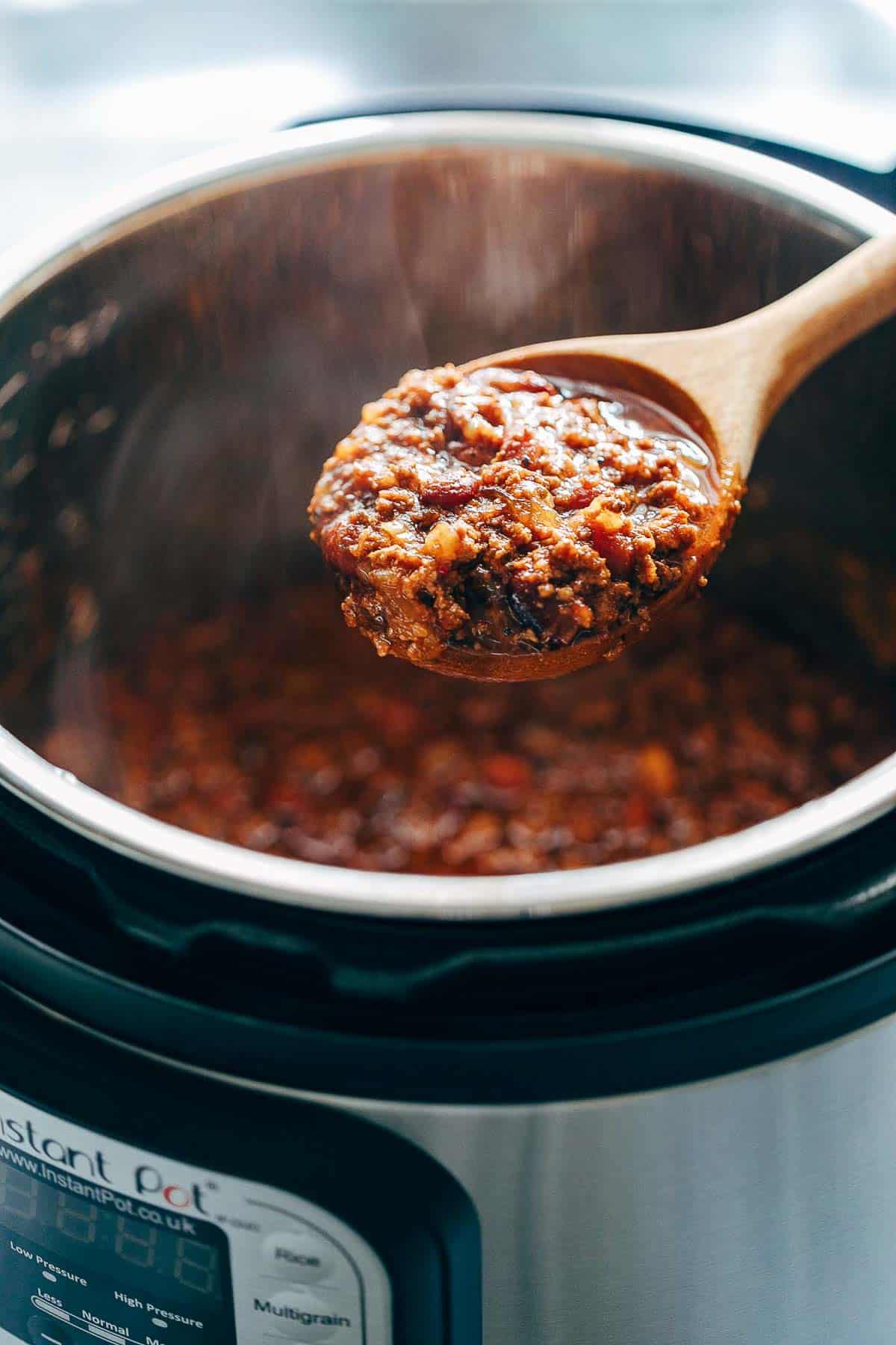 Instant Pot Chipotle Chili is the easiest and fastest way to make chili at home. It's spicy, homemade, comfort food that will keep you warm and makes for a great one pot family dinner. Leftovers taste even better the next day!