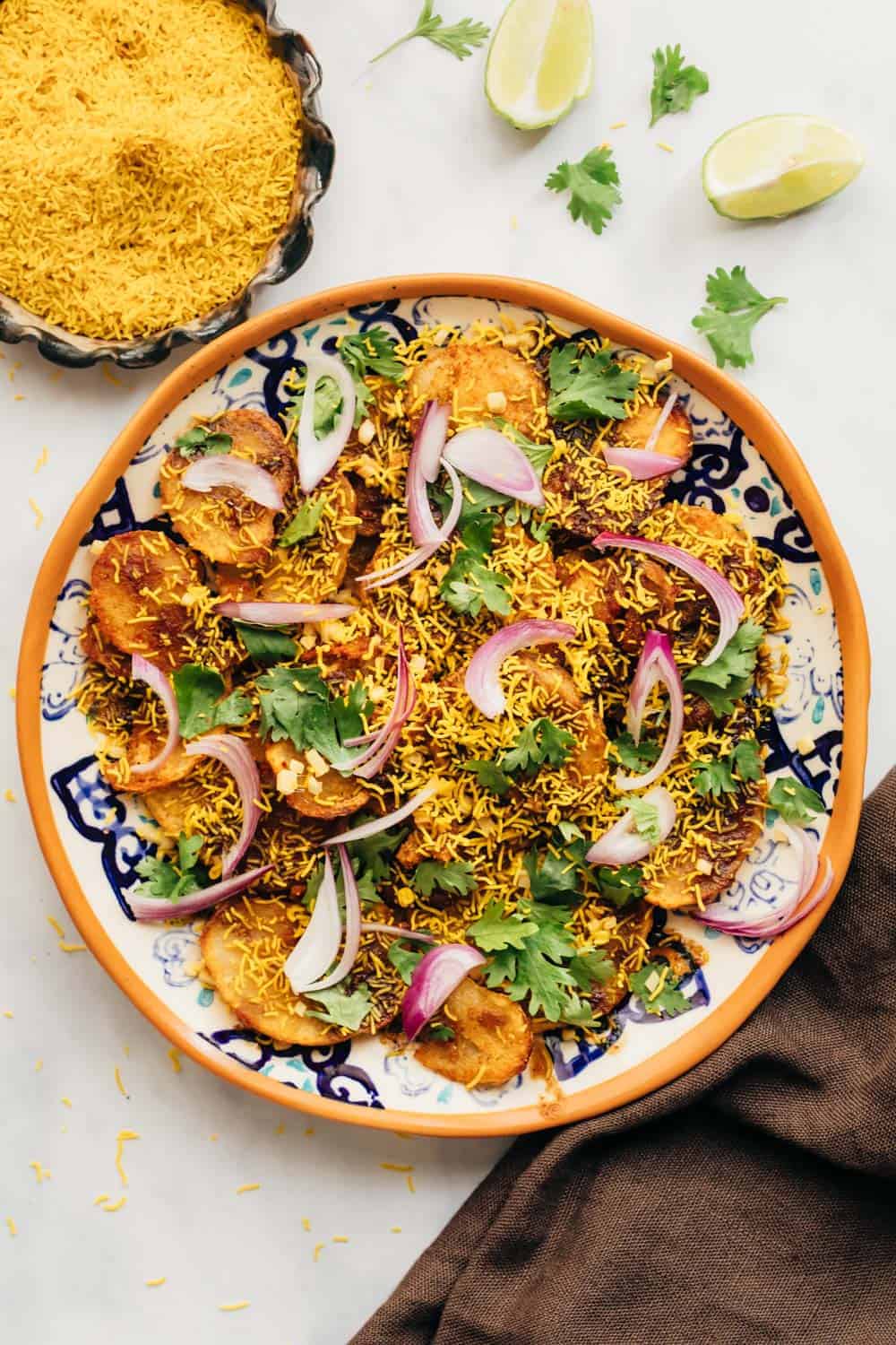 Easy Aloo Chaat - delhi style served on a plate with sev on the side