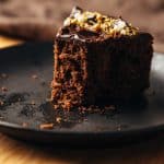 Bite showing texture of eggless chocolate cake