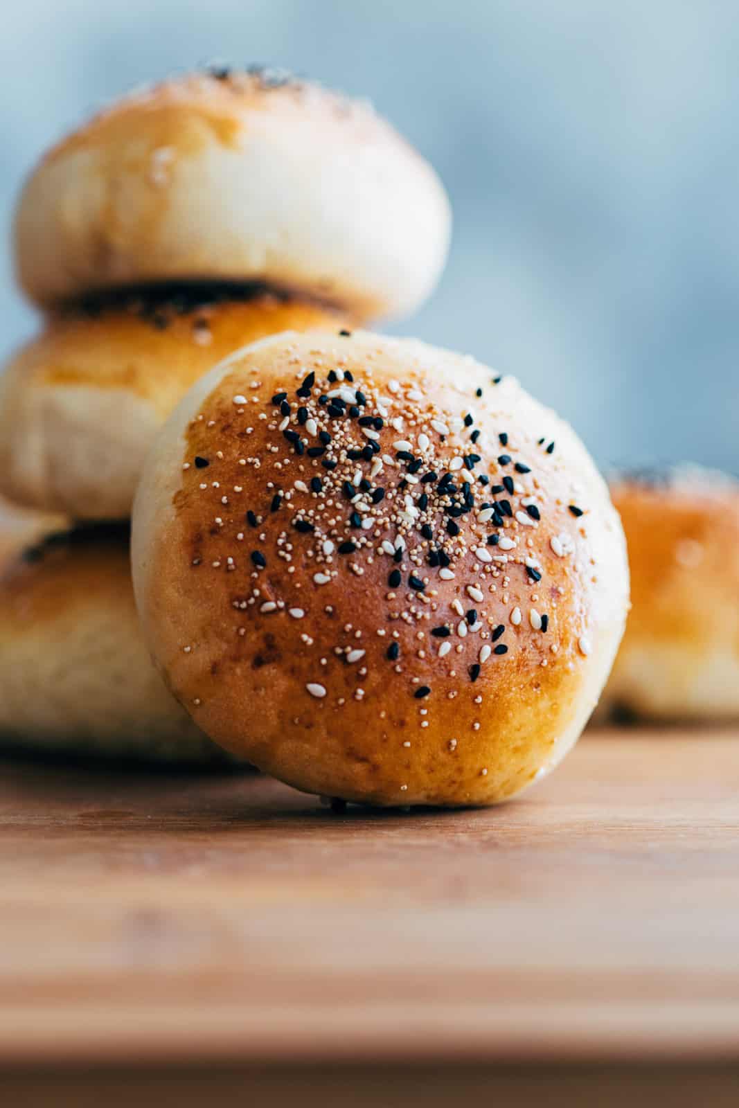 Cheese pepperoni bombs stacked on a serving board