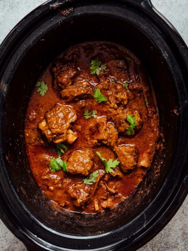 Slow cooker lamb curry pictured in a slow cooker