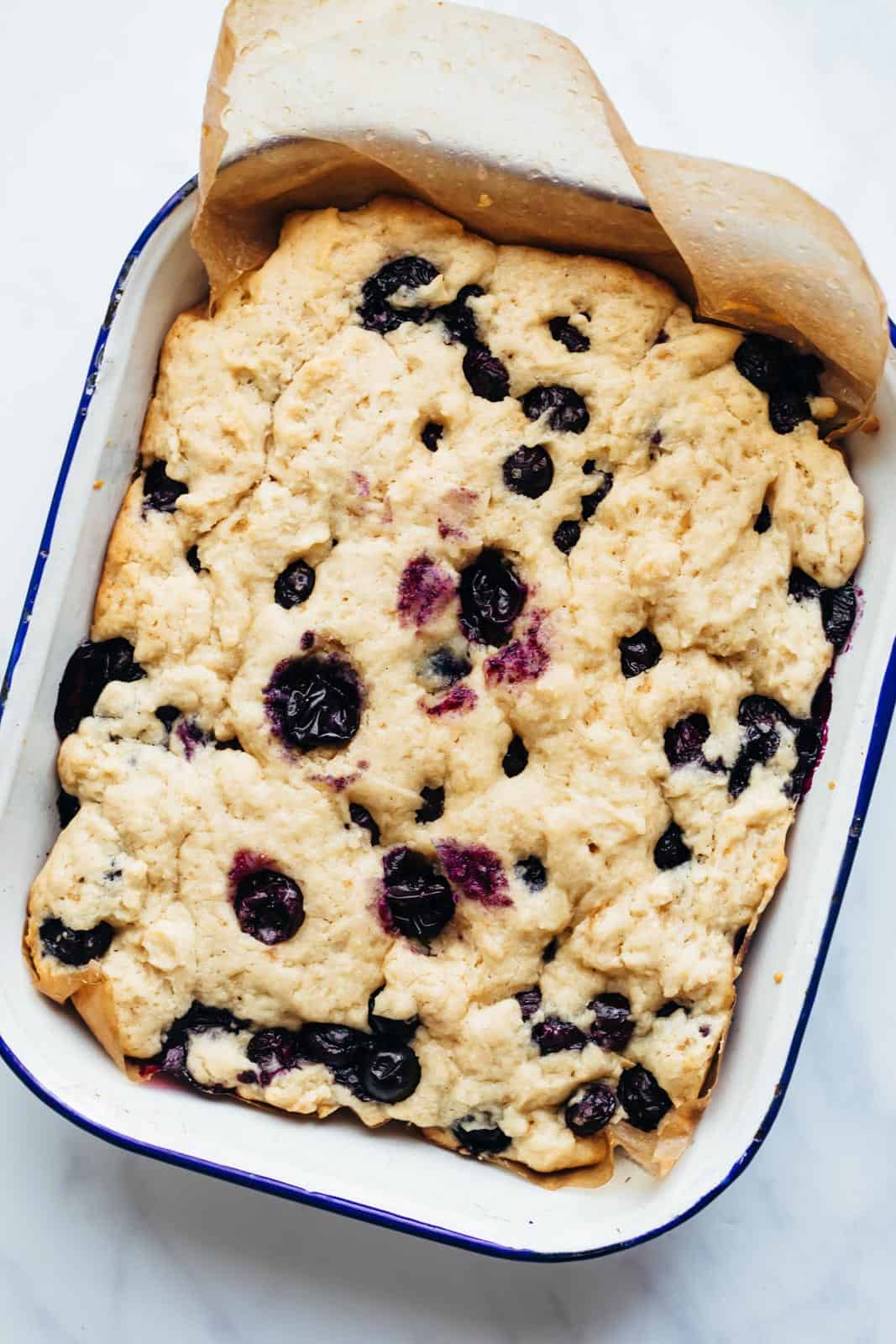Lemon Blueberry Cake Bars baked in a cake tin