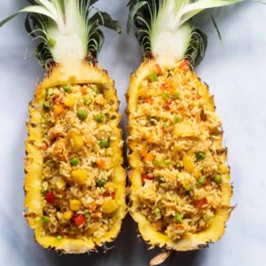Thai Pineapple fried rice served in pineapple boats