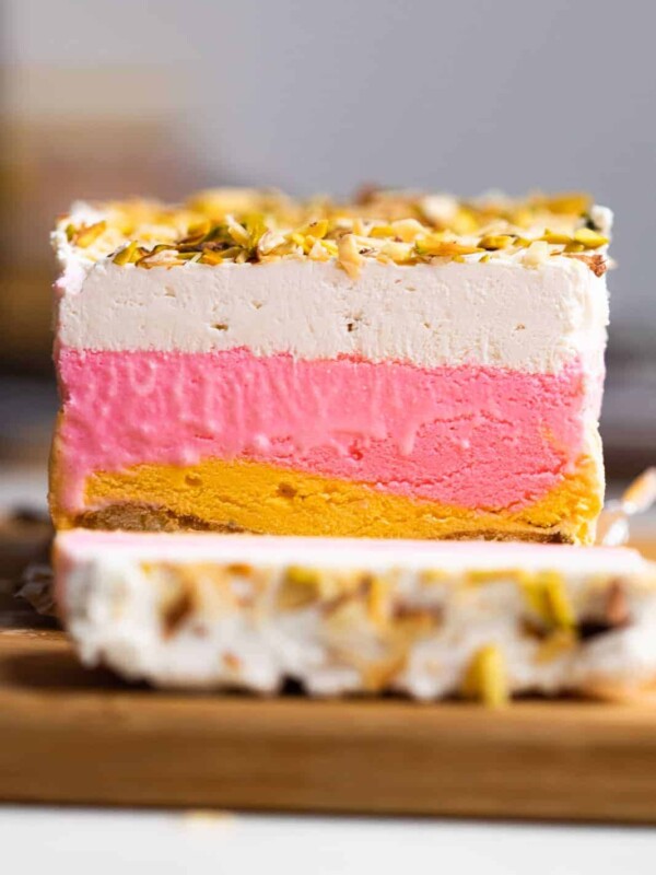 Classic Cassata sliced on a worktop showing all the four layers