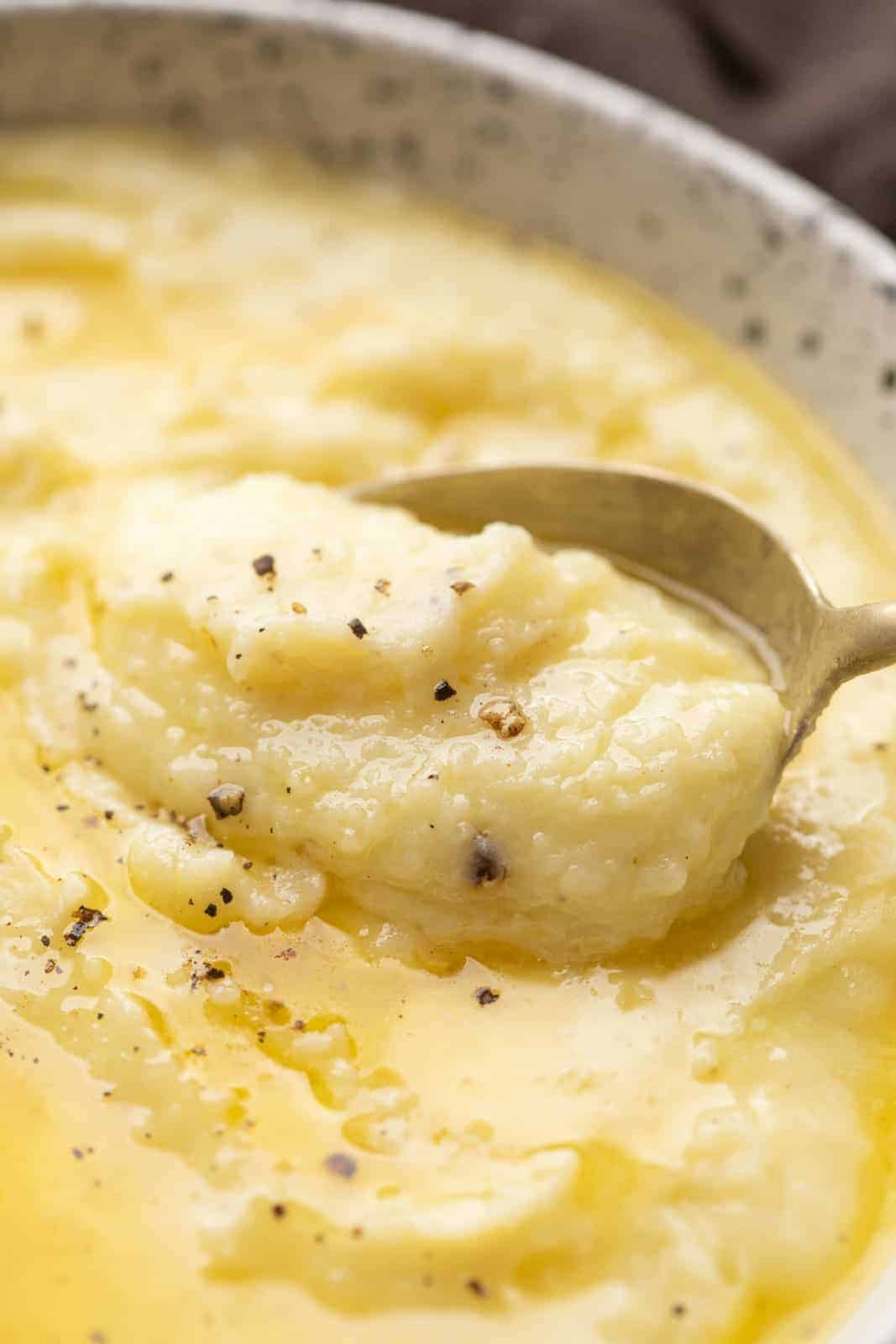 Closeup of a spoonful of creamy mashed potatoes