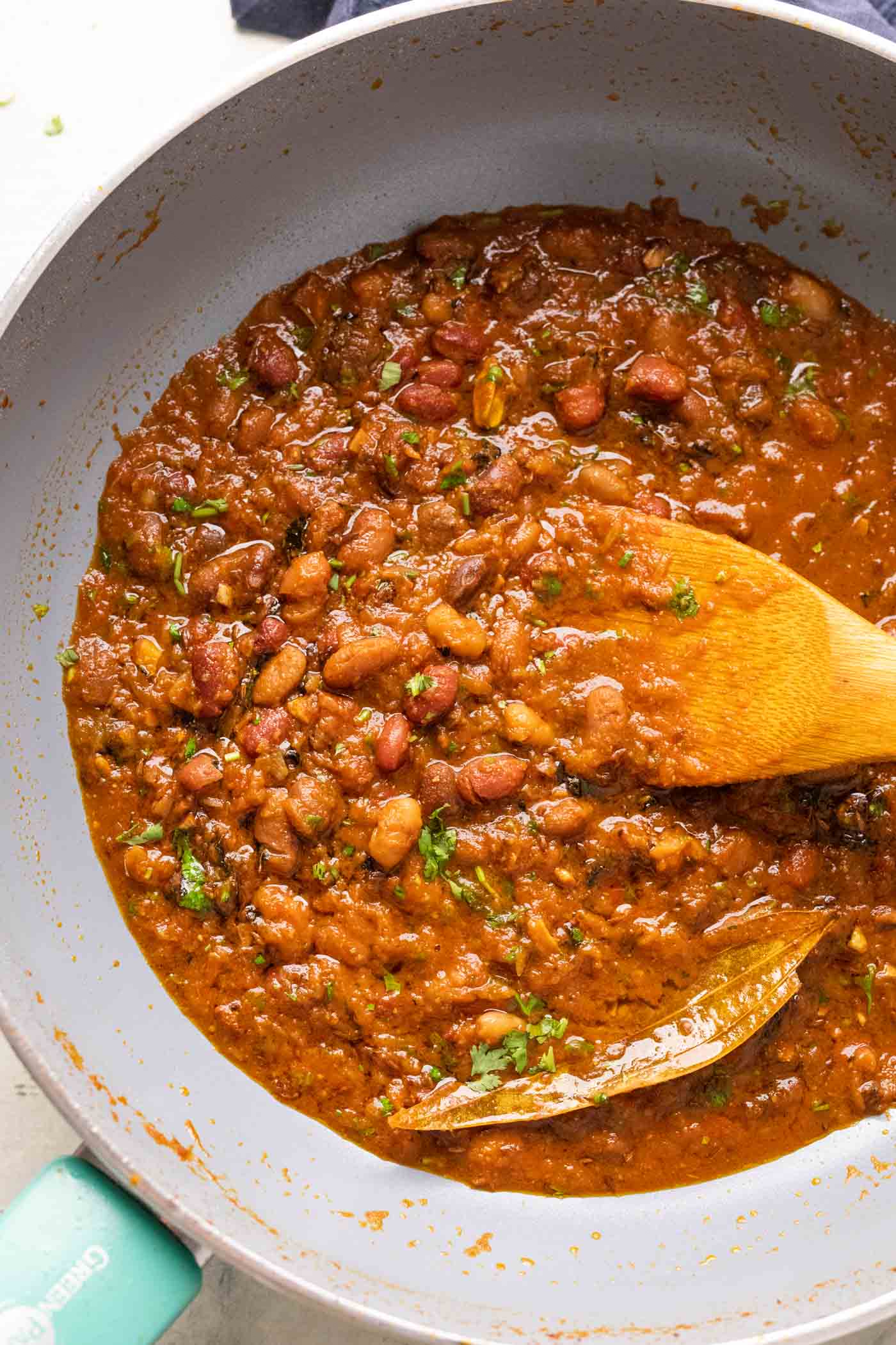 Rajma masala cooked in a grey pan