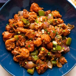 Gobi manchurian served in a blue bowl