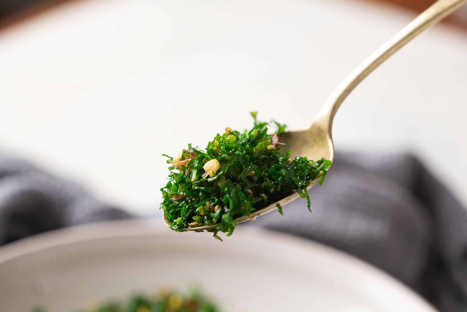 Crispy fried spinach in a spoon