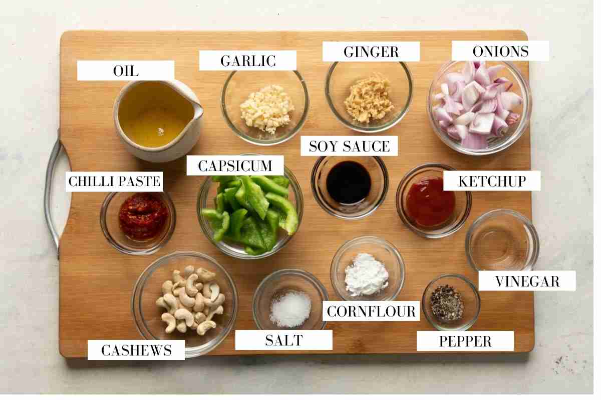 Ingredients for making dragon chicken laid out on a table with text to identify them