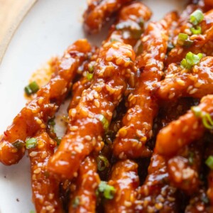 close up image of crispy honey chilli potatoes to showcase their texture