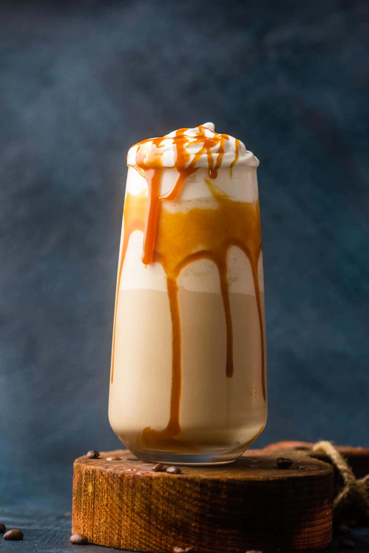 Caramel cold coffee served in a tall glass