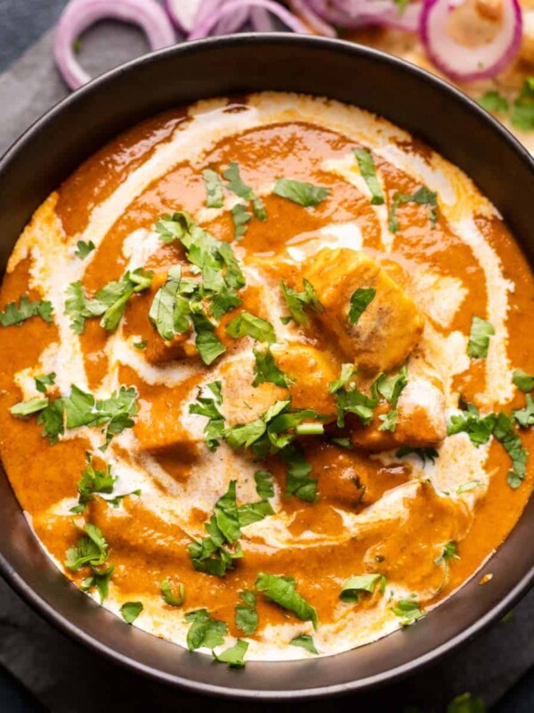 Picture of shahi paneer served in a black bowl