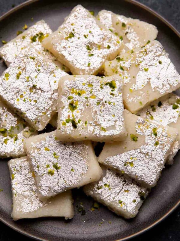 Coconut barfi served on a grey plate