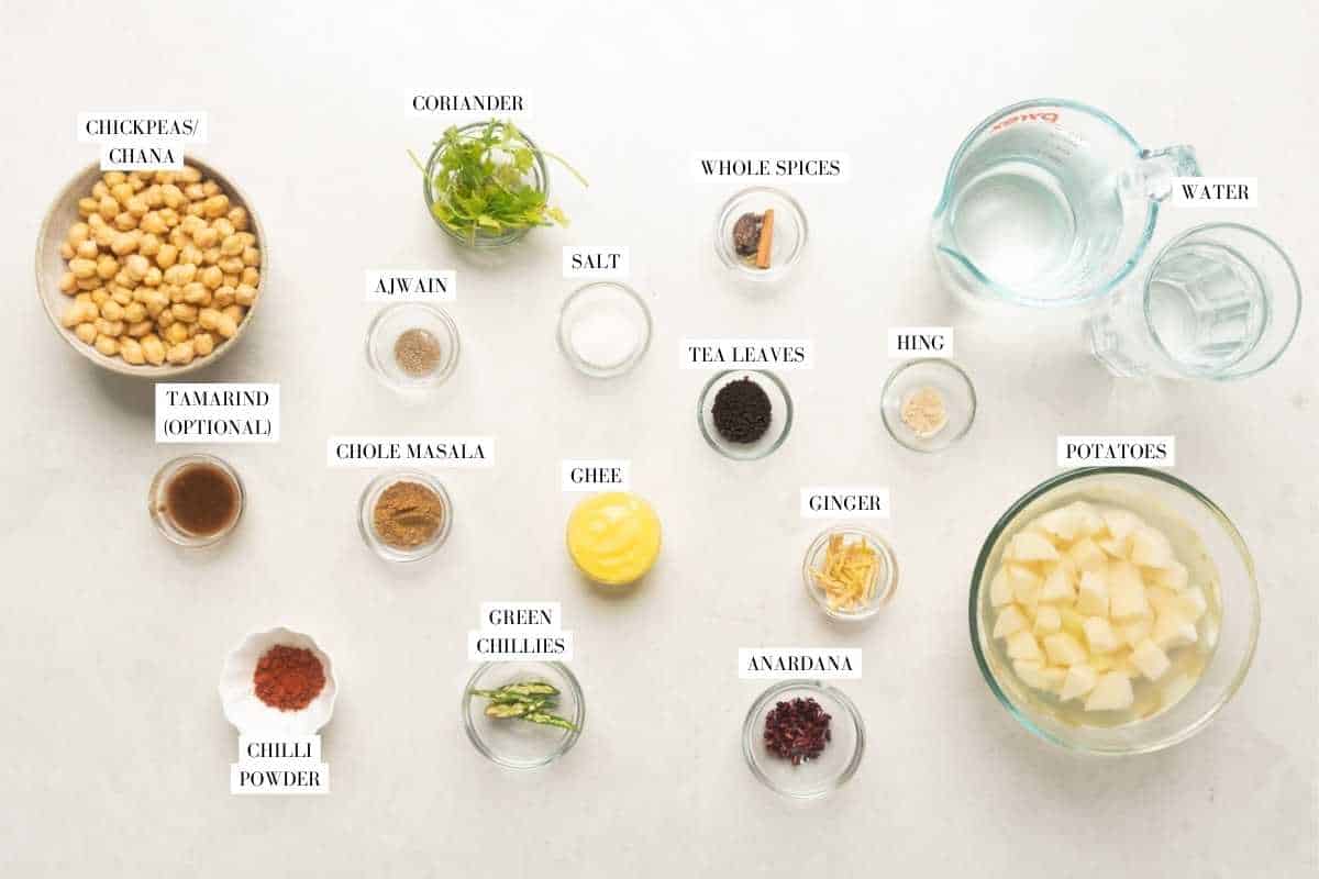 Picture of all the ingredients for pindi chole with text overlay to identify them