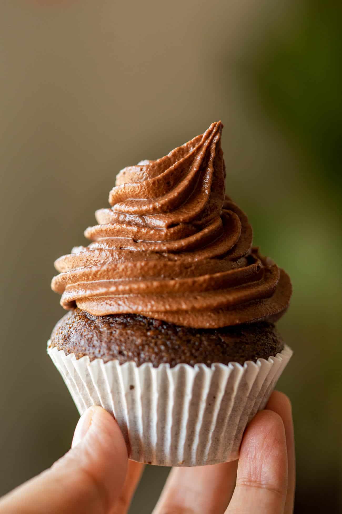 chocolate cupcake with a swirl of chocolate buttercream