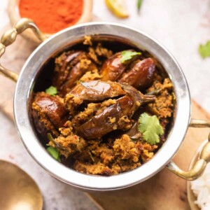 Picture of air fryer stuffed baingan served in a steel bowl