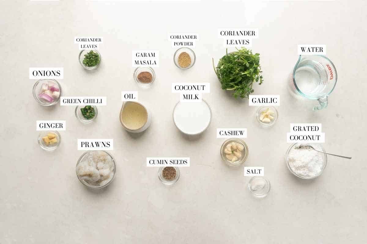 Picture of all the ingredients for Prawn green curry with text to identify them